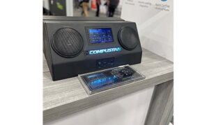 Compustar shows radio that is the first with a built-in Maestro module at the 2024 SEMA Show.